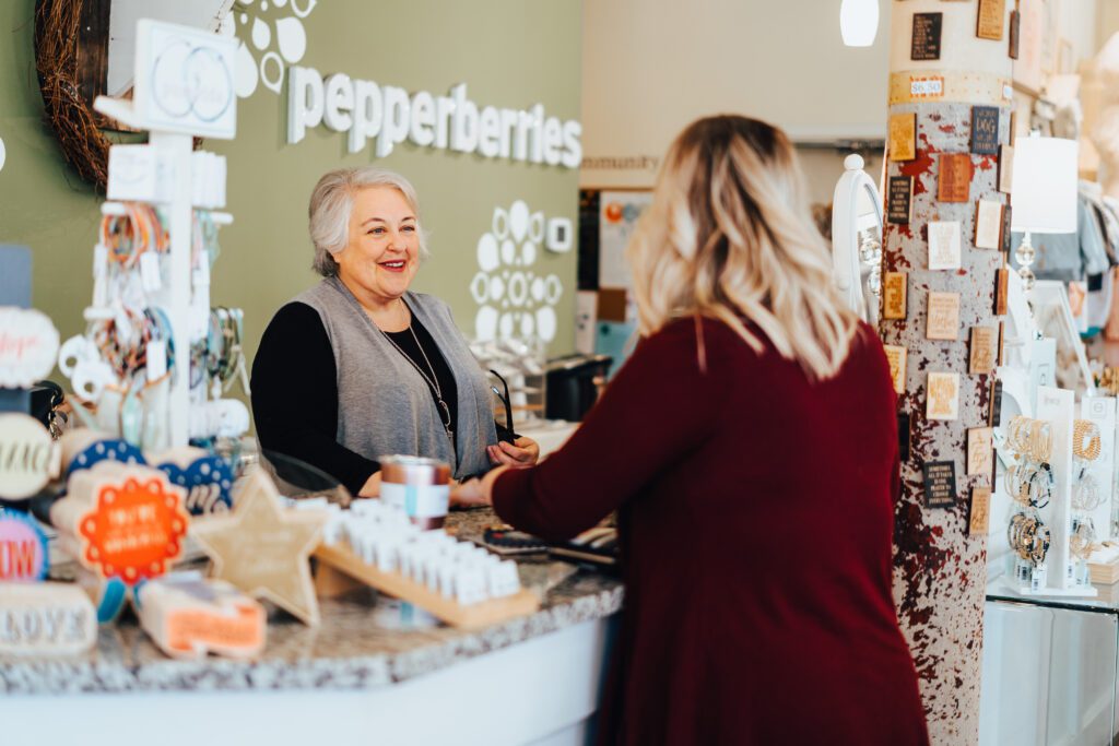 cashier and customer talking