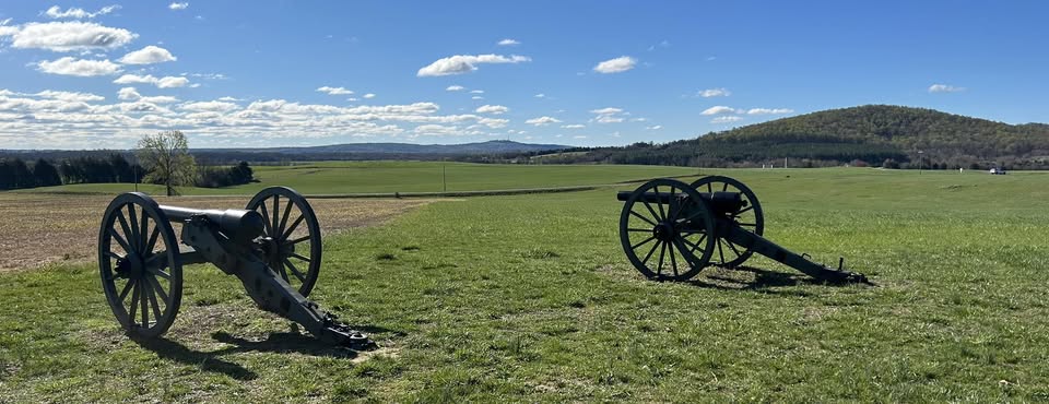 two cannons sitting on Cedar Mountain Battlefield