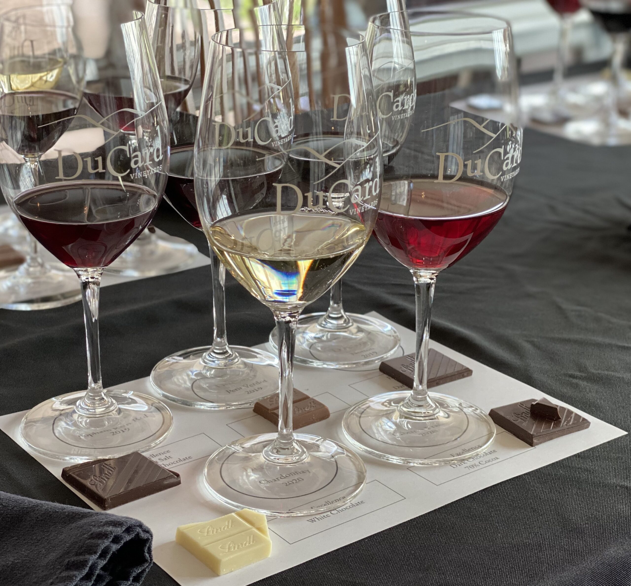 glasses of white and red wine paired with chocolate