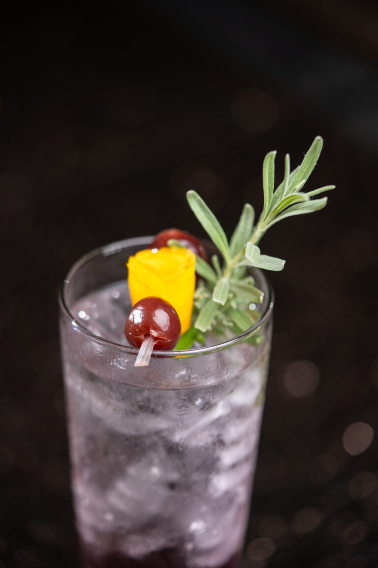 mixed drink with rosemary and pineapple