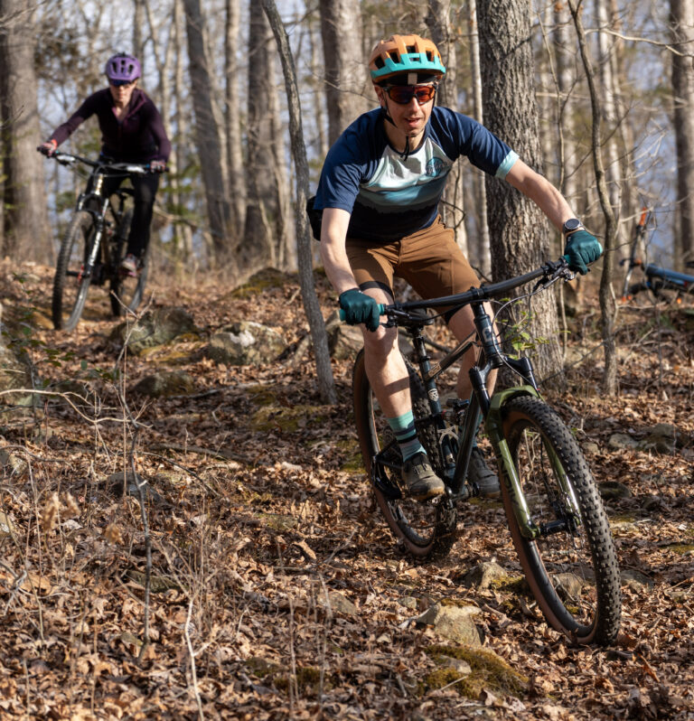 two men mountain biking